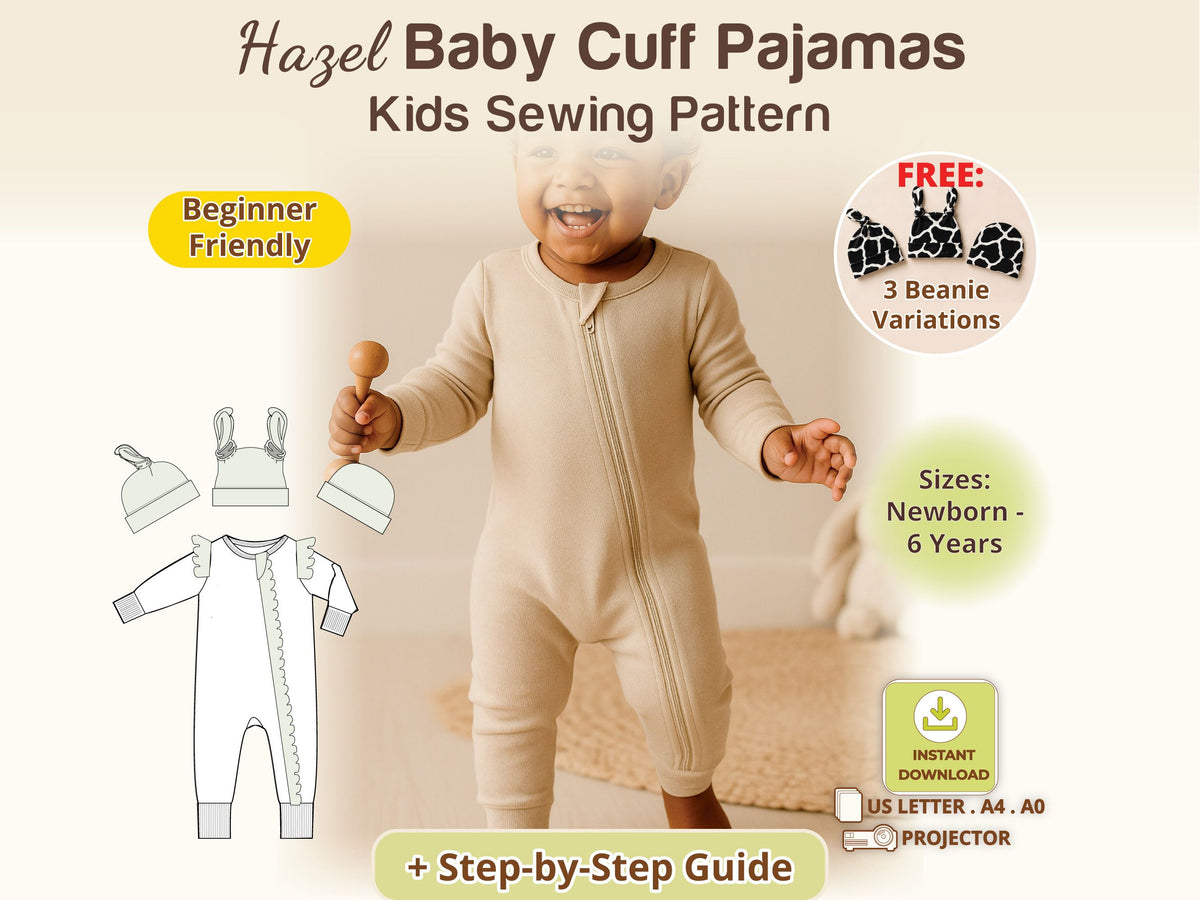 Smiling toddler in the beige Hazel one-piece zip romper with cuffs – baby pajama sewing pattern, sizes newborn–6 years